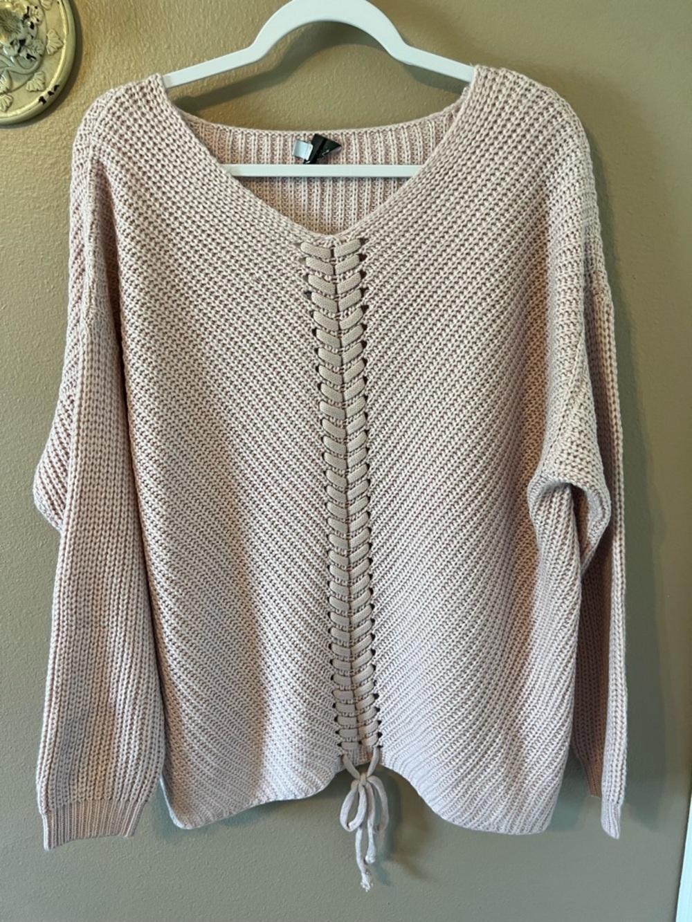 Relaxed V-Neck Lace-Up Sweater in Blush Pink